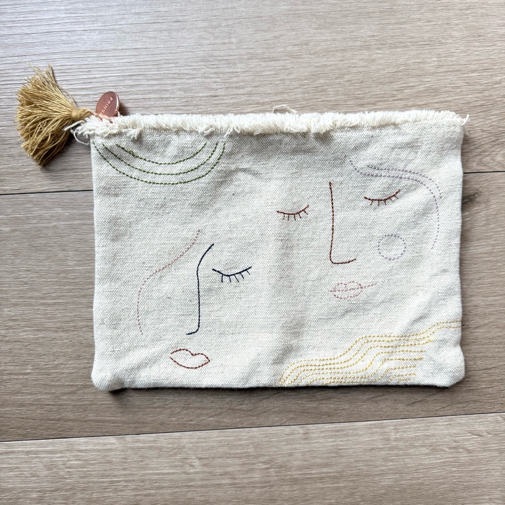 NWOT Fringe Studio Embroidered Face Design Pouch with Tassel Canvas Embroidered